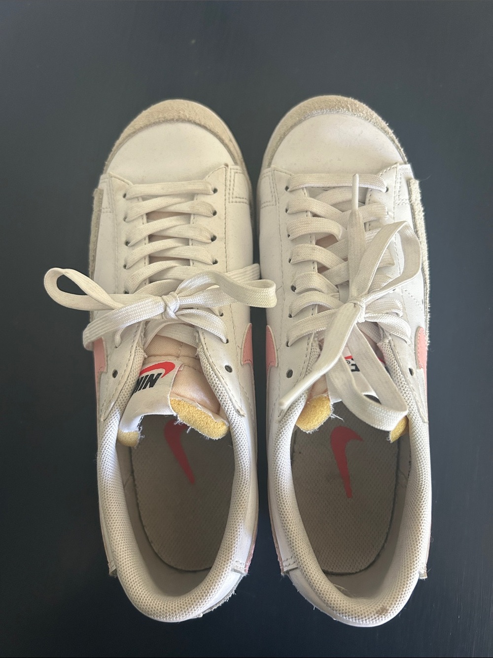 Nike Women’s Low-Top Sneakers in Off-White with Pink Swoosh